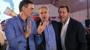 Zapatero y Sánchez en un evento político en España
